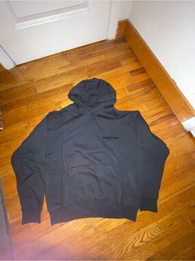 Fear of God Essentials Black Hoodie with Subtle Logo
